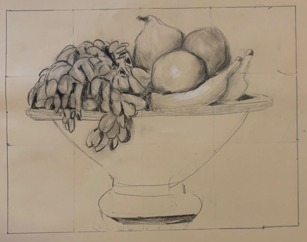 Alzata con uva, pere e banane a matita